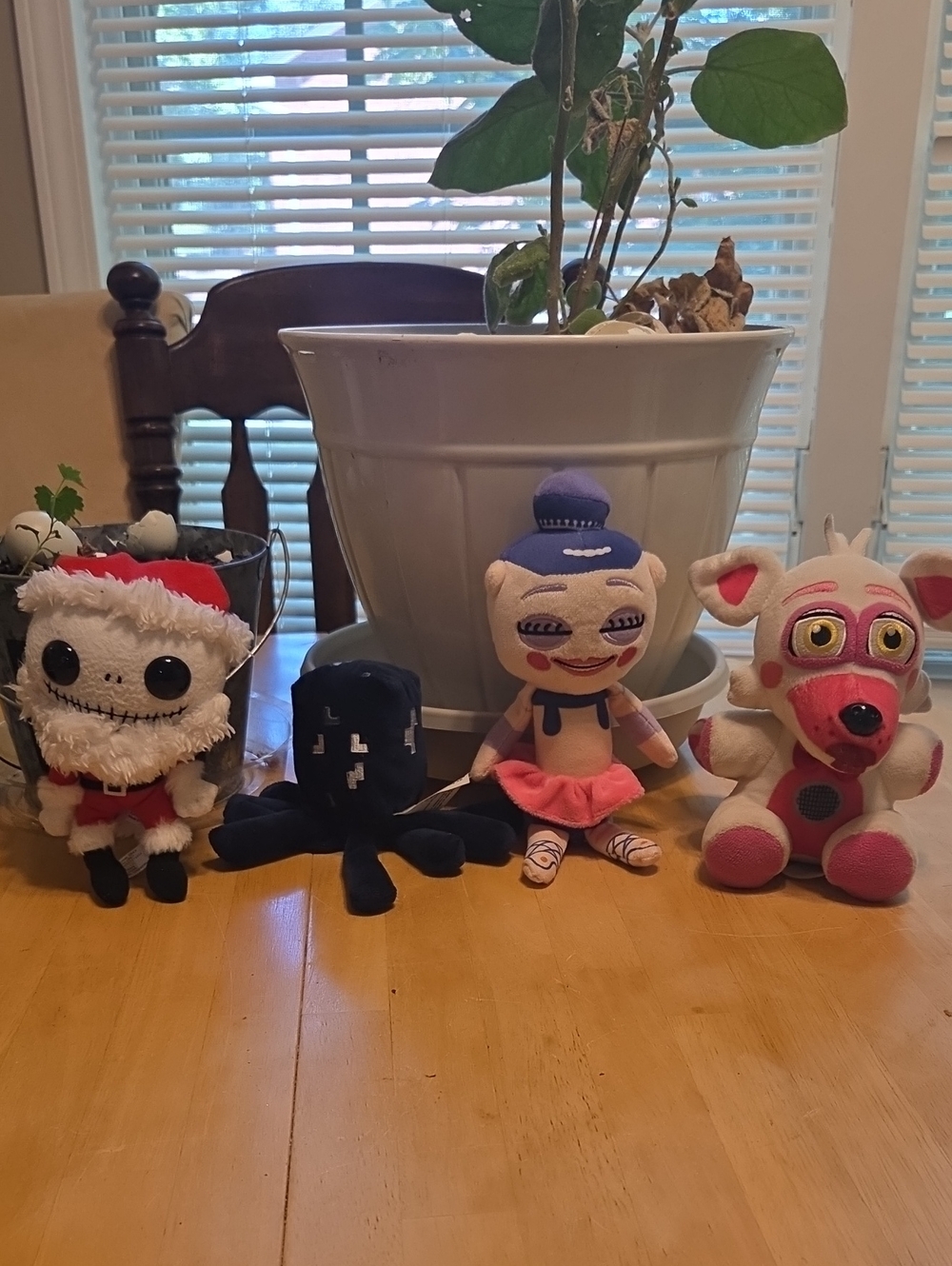 Four Plush Character Dolls - Pink, White, Black